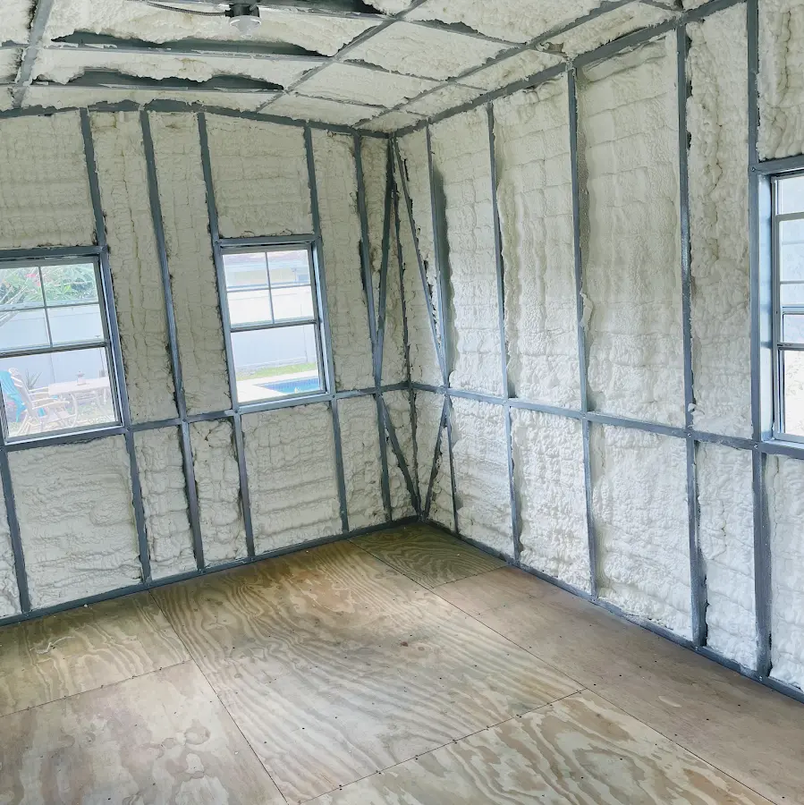 Closed-cell spray foam insulation applied to wall cavities in a residential project in Sandusky